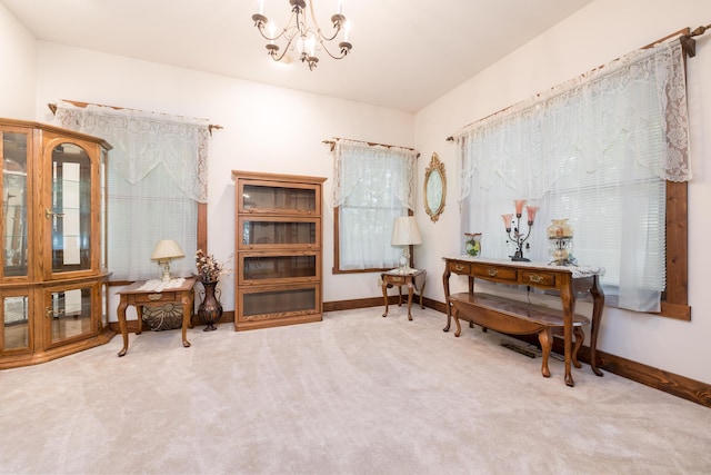 4602 State Route 273, Belle Center, OH 43310 - living area featuring carpet flooring, a chandelier, and baseboards
