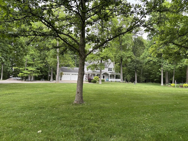 4602 State Route 273, Belle Center, OH 43310 - view of front facade with a front lawn and a garage
