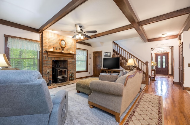 4602 State Route 273, Belle Center, OH 43310 - living room featuring beamed ceiling, stairs, wood finished floors, baseboards, and ceiling fan