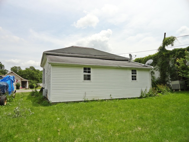203 N Koke St, De Graff, OH 43318 - view of side of home with a yard