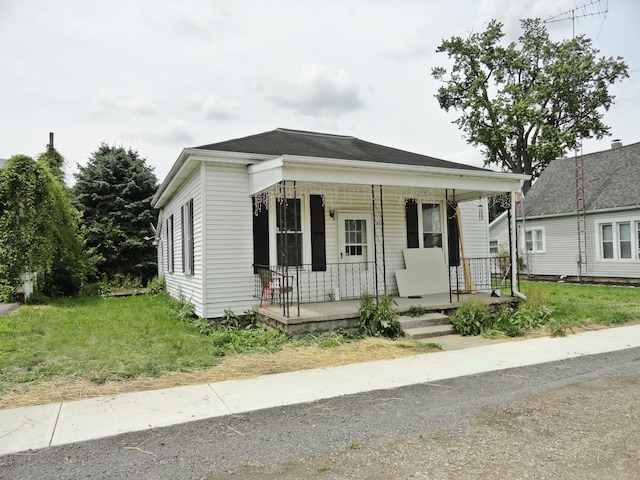 203 N Koke St, De Graff, OH 43318 - view of front of home featuring covered porch