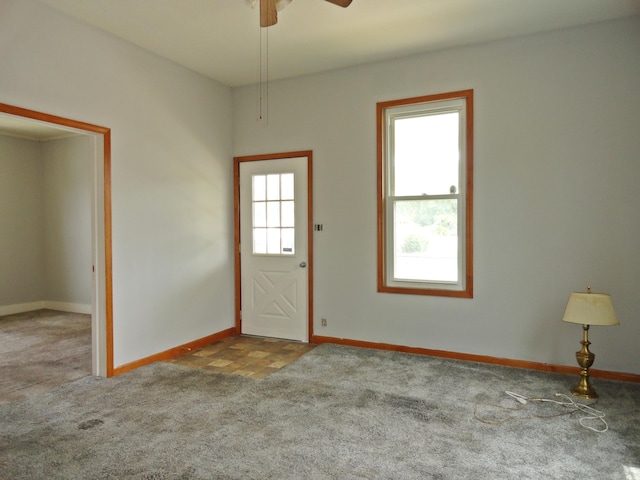 203 N Koke St, De Graff, OH 43318 - carpeted entrance foyer featuring baseboards and ceiling fan