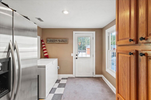 laundry area with washing machine and dryer