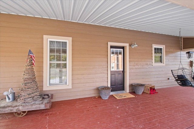 doorway to property with a deck