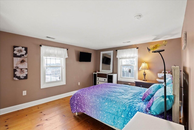 bedroom featuring hardwood / wood-style flooring