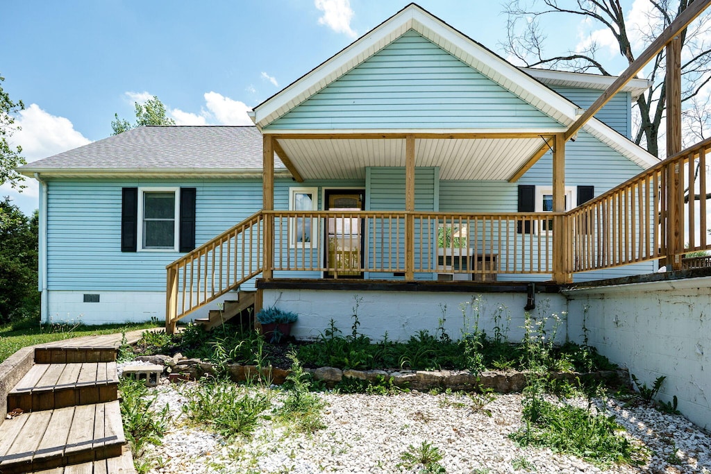 4403 Clayton Rd, Brookville, OH 45309 - back of property featuring a shingled roof, crawl space, and a porch