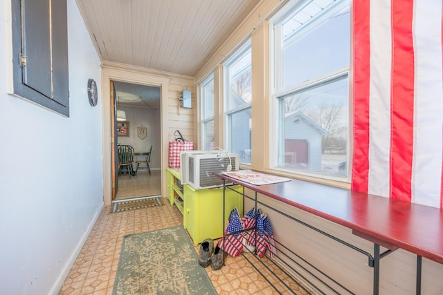 interior space with wooden ceiling and cooling unit