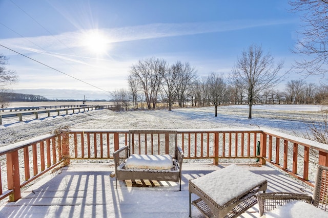 view of snow covered deck