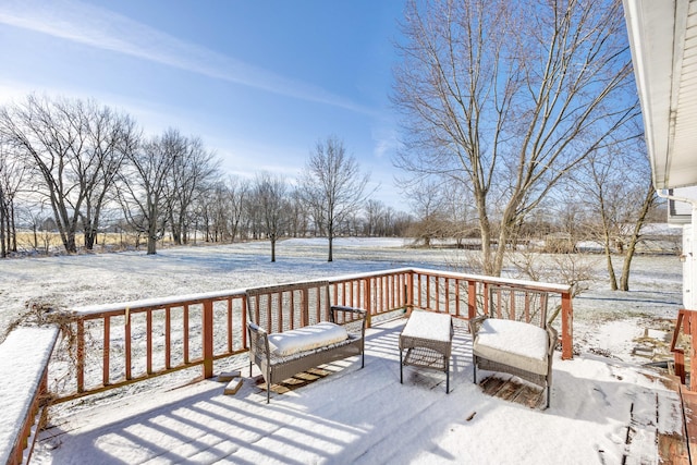 view of snow covered deck