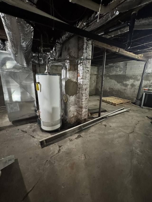 411 Middle St, Wapakoneta, OH 45895 - unfinished basement featuring water heater and heating unit