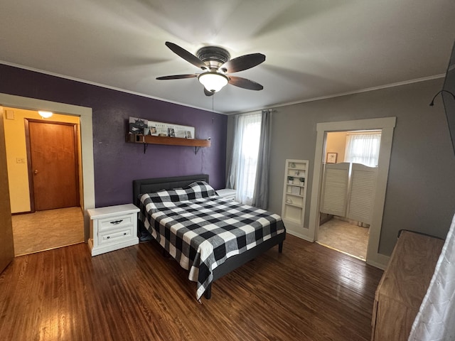 411 Middle St, Wapakoneta, OH 45895 - bedroom with wood finished floors, crown molding, a ceiling fan, and baseboards