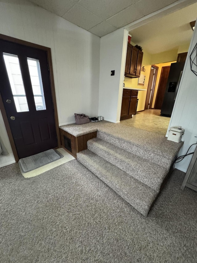 411 Middle St, Wapakoneta, OH 45895 - foyer entrance featuring light carpet