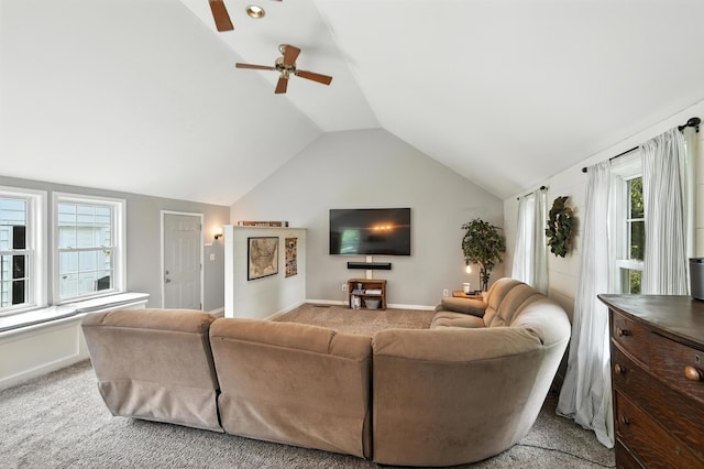 650 Swailes Rd, Troy, OH 45373 - carpeted living area featuring a ceiling fan, lofted ceiling, and plenty of natural light