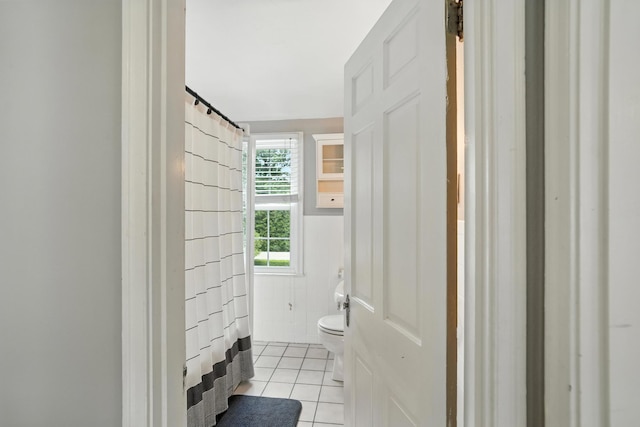 650 Swailes Rd, Troy, OH 45373 - bathroom with tile patterned flooring, tile walls, and a shower with shower curtain