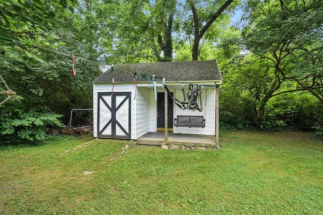 650 Swailes Rd, Troy, OH 45373 - view of shed with view of wooded area