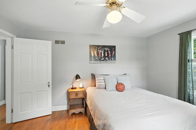 650 Swailes Rd, Troy, OH 45373 - bedroom featuring wood finished floors and a ceiling fan