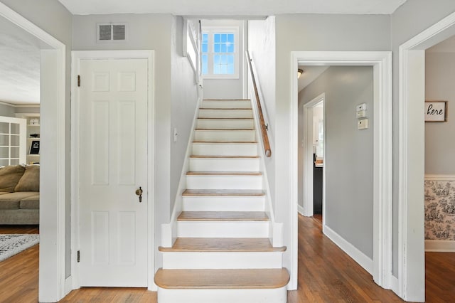 650 Swailes Rd, Troy, OH 45373 - stairs featuring wood finished floors