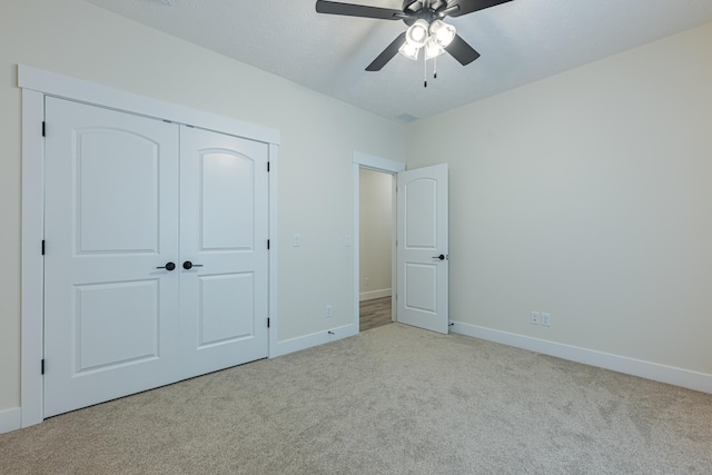210 N Branch, Tipp City, OH 45371 - unfurnished bedroom featuring carpet floors, a closet, and ceiling fan