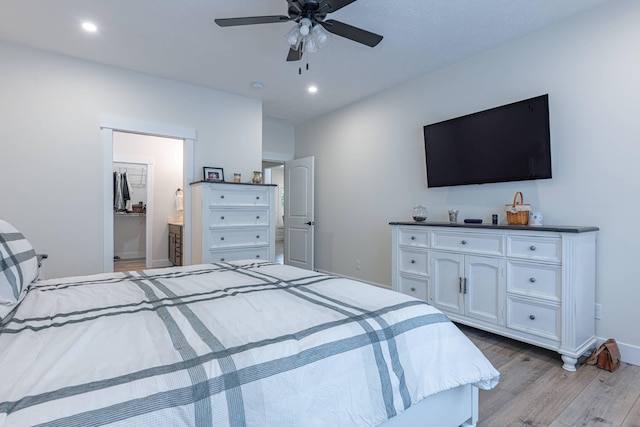 210 N Branch, Tipp City, OH 45371 - bedroom featuring light wood-style flooring, recessed lighting, ceiling fan, and ensuite bathroom