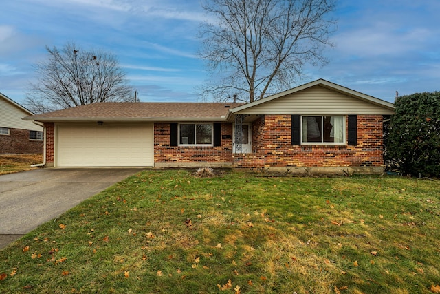 ranch-style house with a garage and a front lawn