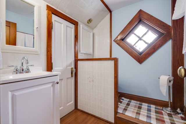 bathroom with wood-type flooring and vanity