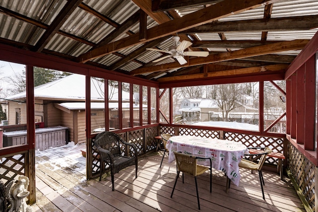 snow covered deck with ceiling fan and a gazebo