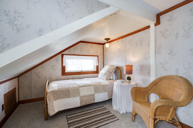 bedroom with vaulted ceiling and carpet floors