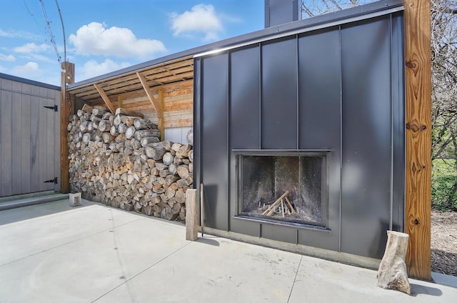 exterior space with a fireplace