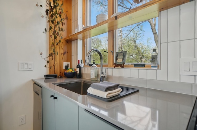 202 Fairfield Pike Unit A, Yellow Springs, OH 45387 - kitchen featuring plenty of natural light, a sink, dishwasher, and light countertops