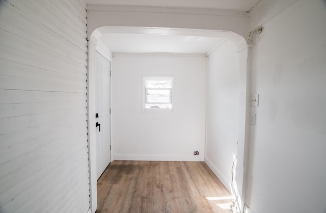 interior space with light wood-style flooring and baseboards