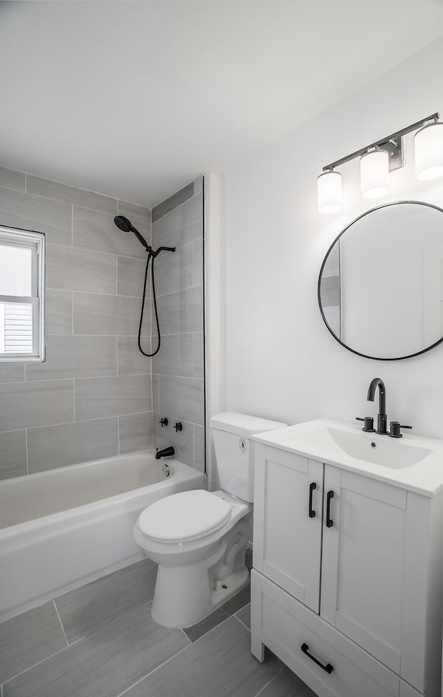 full bathroom with vanity, toilet, and shower / bathtub combination