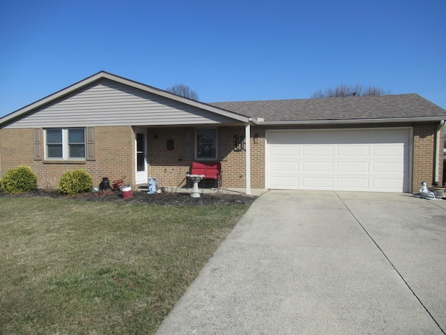 single story home featuring brick siding, a front lawn, concrete driveway, roof with shingles, and an attached garage