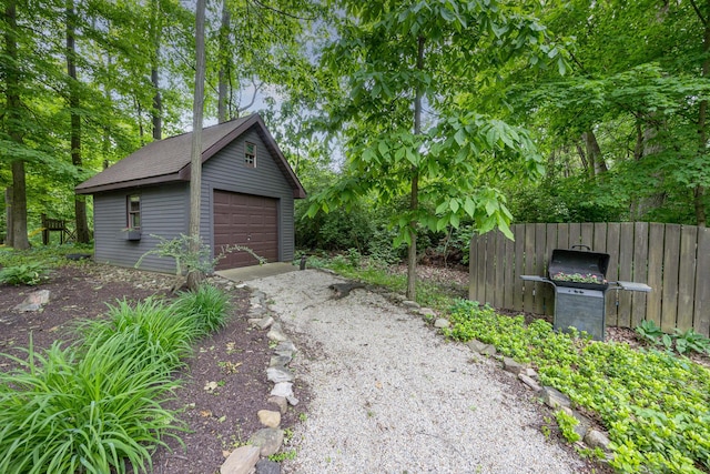 129 Tanglewood Dr, West Liberty, OH 43357 - detached garage featuring driveway