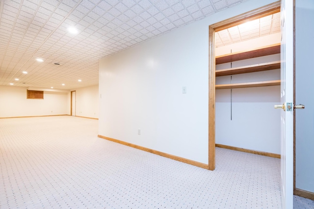 129 Tanglewood Dr, West Liberty, OH 43357 - below grade area with carpet, recessed lighting, and baseboards