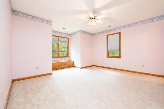 129 Tanglewood Dr, West Liberty, OH 43357 - carpeted spare room featuring ceiling fan and baseboards
