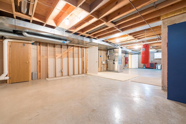 129 Tanglewood Dr, West Liberty, OH 43357 - unfinished below grade area with heating unit and water heater