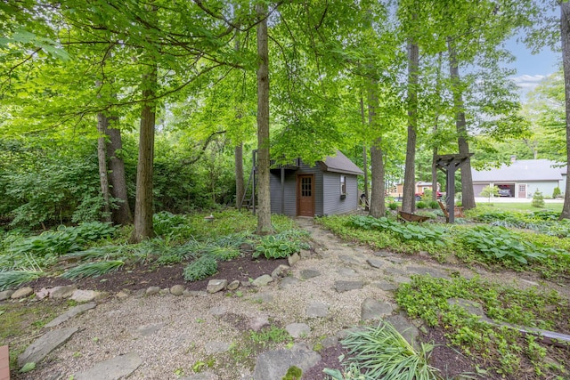 129 Tanglewood Dr, West Liberty, OH 43357 - view of yard with an outdoor structure