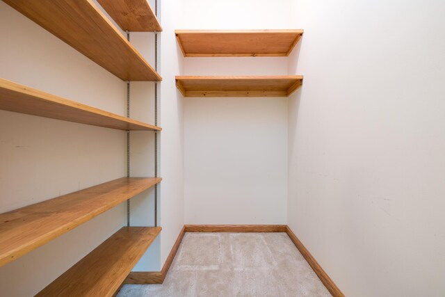 129 Tanglewood Dr, West Liberty, OH 43357 - spacious closet featuring light carpet