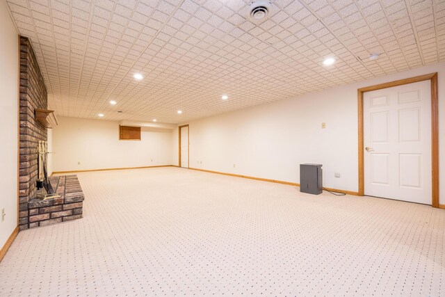 129 Tanglewood Dr, West Liberty, OH 43357 - finished basement featuring light colored carpet, baseboards, and recessed lighting