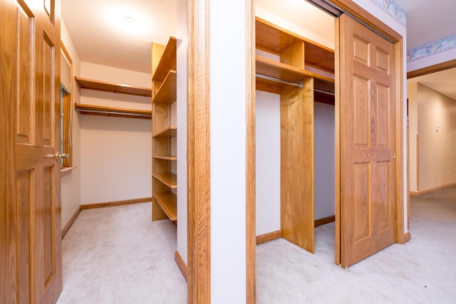 129 Tanglewood Dr, West Liberty, OH 43357 - spacious closet featuring carpet