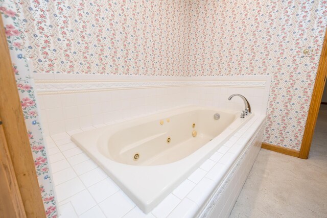 129 Tanglewood Dr, West Liberty, OH 43357 - full bathroom featuring wallpapered walls, a whirlpool tub, and baseboards