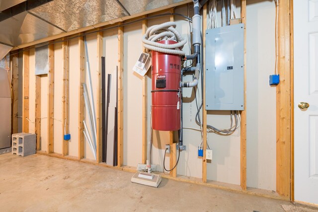 129 Tanglewood Dr, West Liberty, OH 43357 - utility room featuring electric panel and a central vacuum unit