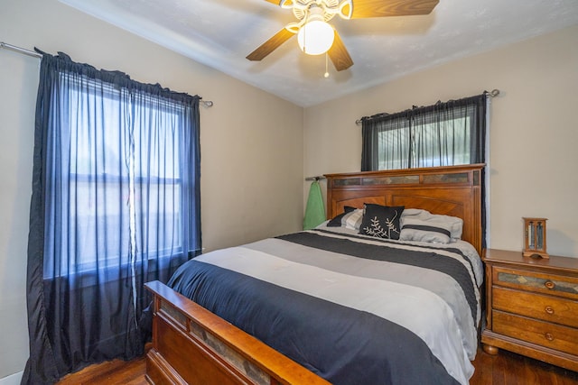 1920 Coventry Rd, Dayton, OH 45420 - bedroom featuring wood finished floors, multiple windows, and a ceiling fan