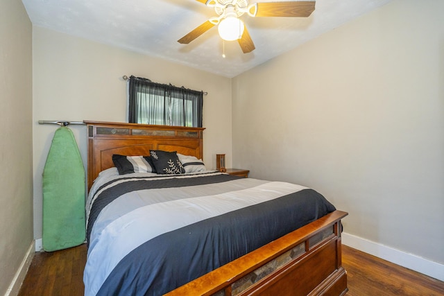 1920 Coventry Rd, Dayton, OH 45420 - bedroom with baseboards, dark wood-type flooring, and a ceiling fan