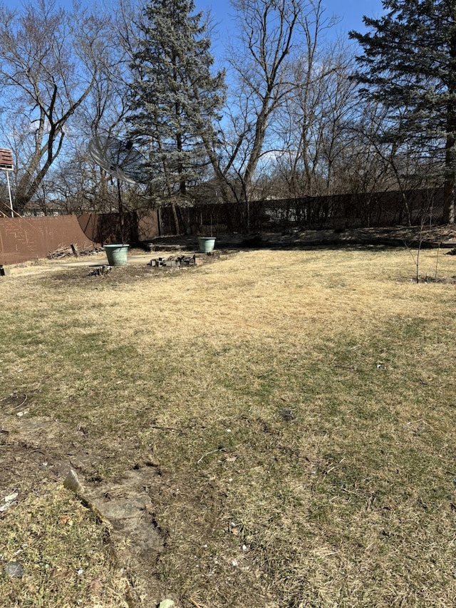 view of yard with fence