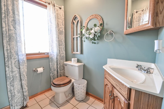 full bath featuring baseboards, vanity, toilet, and tile patterned floors