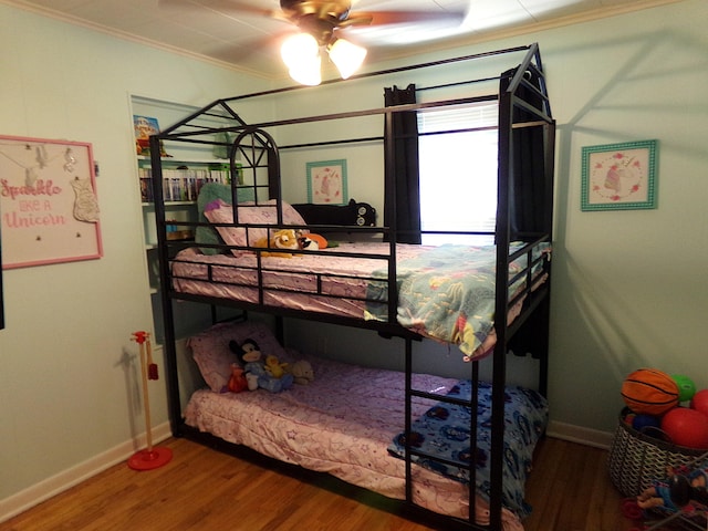 88 E Clark St, North Hampton, OH 45349 - bedroom featuring wood finished floors, ornamental molding, and baseboards