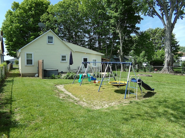 88 E Clark St, North Hampton, OH 45349 - back of property featuring a playground and central AC