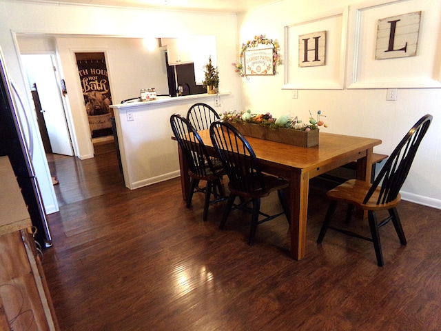 88 E Clark St, North Hampton, OH 45349 - dining room featuring dark wood-type flooring and baseboards
