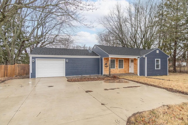 single story home with a garage